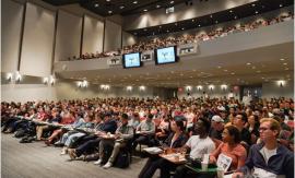 Cornell students in large auditorium, photo by Jing Jiang / Sun Assistant Photography Editor