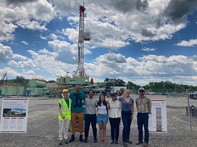 CUBO faculty and students the day the drill mast was raised, shortly before drilling began. From left to right: Terry Jordan, Roberto Clairmont, Ivan Purwamaska, Daniela Pinilla, Reeby Puthur, Madeline Fresonke and Patrick Fulton.