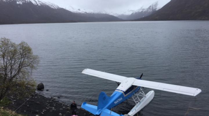 Pilot Titus unloads seismic equipment in Uyak Bay