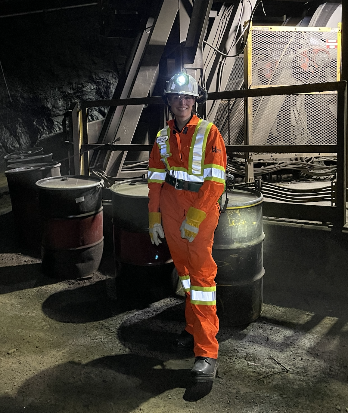 Hannah Lang dressin in safely gear in a mine.